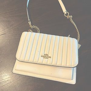 Coach white bag . Rarely used. Very good condition.